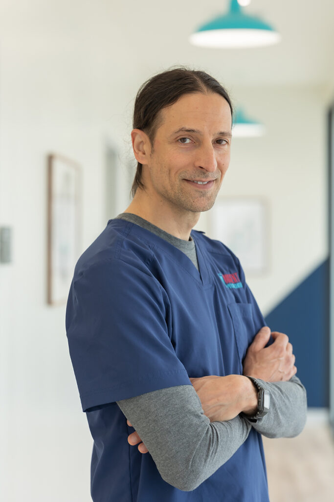 Veterinary Technician Aaron Brenner at Urgent Pet Care Center in OKC.